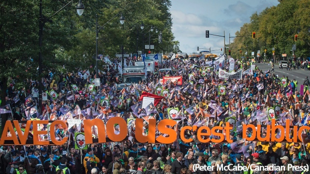 A Quebec coalition of public-sector unions marching in early October 2015. (Peter McCabe/Canadian Press)