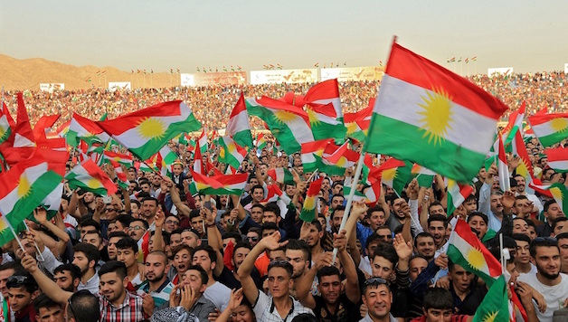 Kurdish people attend a rally to show their support for the upcoming September 25th independence referendum in Duhuk