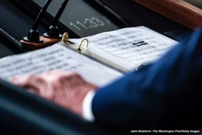 President Donald J. Trump WASHINGTON, DC - MARCH 19 : A close up of President Donald J. Trump's notes shows where Corona was crossed out