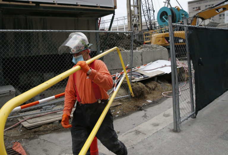 Some Workers Return to Work as Construction Boom Tanks