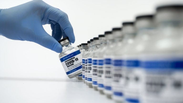 Competition vs. Coordination: The Search for a Vaccine