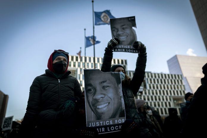Image: US-POLICE-HOMICIDE-MINORITIES